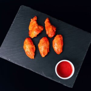 Juicy tandoori chicken nibbles ready to cook