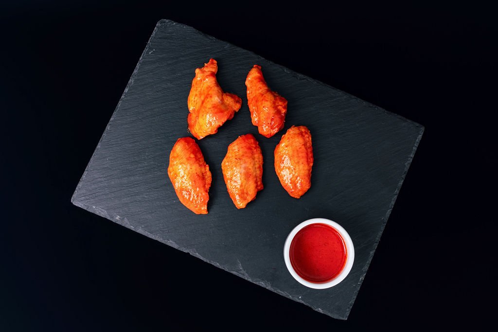 Juicy tandoori chicken nibbles ready to cook